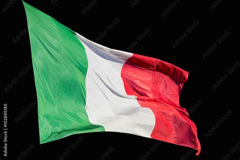 Bandiera italiana che sventola su sfondo nero Stock Photo | Adobe Stock