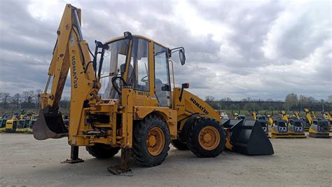 Koparko Ładowarka KOMATSU WB 70A 6T VOLVO BL71 JCB 3CX KOMATSU WB97