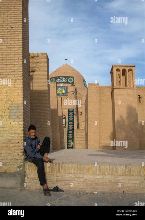 Old Man Sit In Front Of The Jame Mosque Isfahan Province Nain Iran