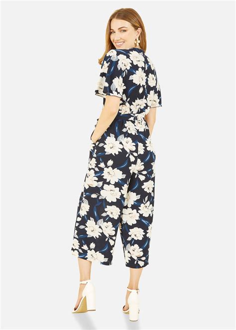 Mela Floral Print Jumpsuit With Angel Sleeves In Navy Matalan