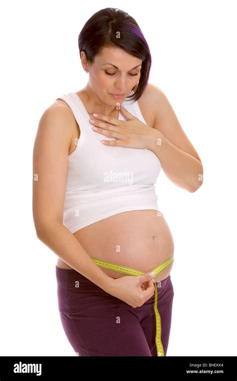 Pregnant Woman Measuring Her Belly Stock Photo Alamy