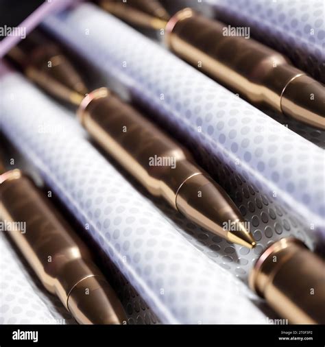 A Production Line At An Ammo Factory With Freshly Manufactured Bullets