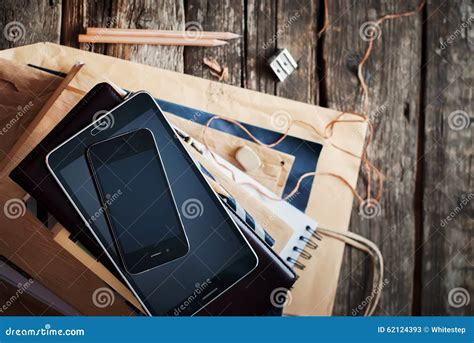 Stack Of Accessories And Digital Gadgets For Business Men Top View