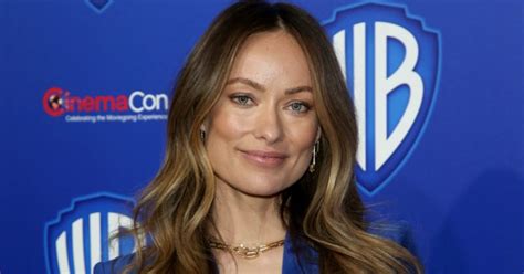 Olivia Wilde wears a black biкini to the beach with a friend photos