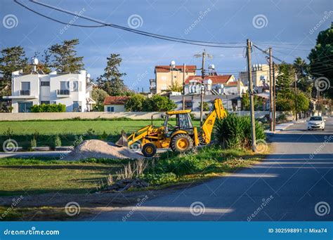 Gaziveren Cyprus Yellow Tractor Standing On The Street