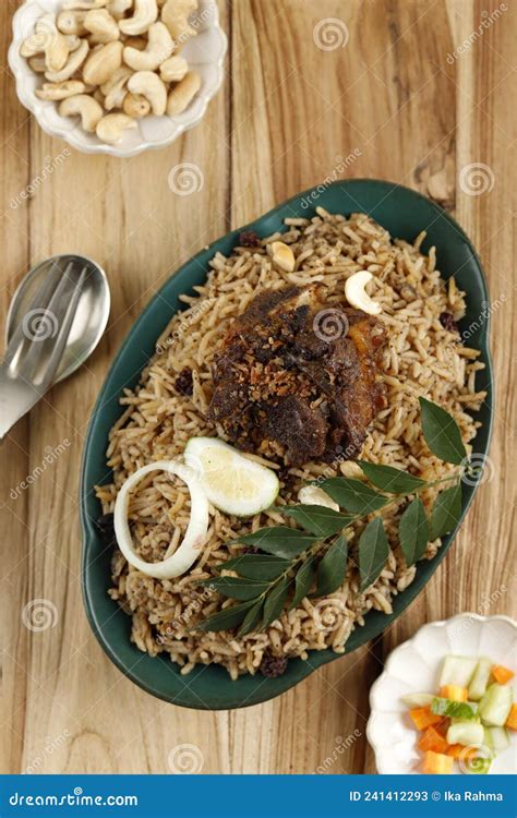 Selective Focus A Plate Of Lamb Mandy Rice Served With Acari And Raisin Stock Image Image Of