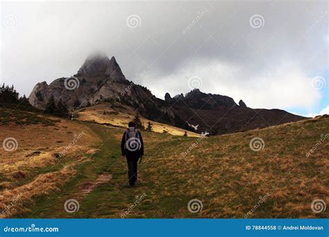 Girl going up the mountain stock photo. Image of travel - 78844558