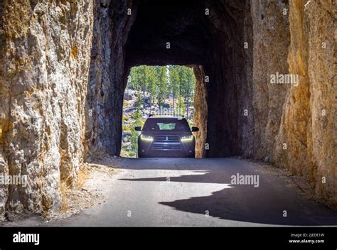 Car In Needles Eye Tunnel On The Needles Highway In Custer State Park