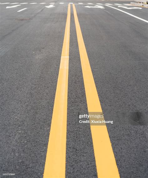 Road Marking Double Yellow Lines High-Res Stock Photo - Getty Images