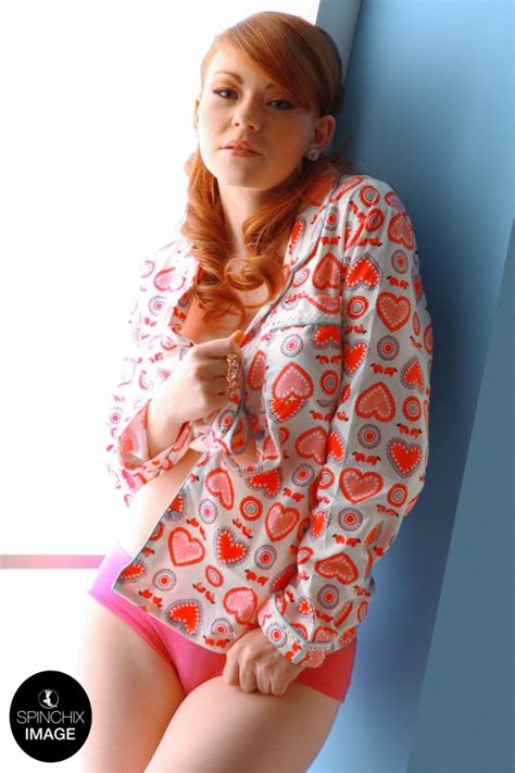 Busty Ginger With Pierced Tits