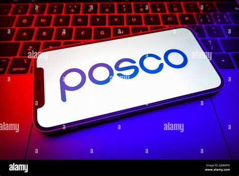 In this photo illustration, a POSCO logo is displayed on the screen of ...