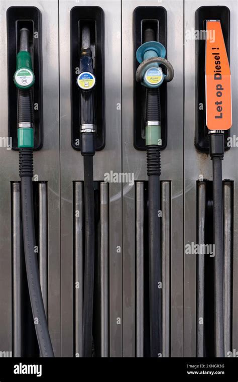 Gas station fuel pumps for different types of gasoline and diesel. Dutch text 'note diesel!' on ...