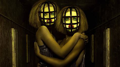 Download American Horror Story Cult Twin Sisters Wallpaper