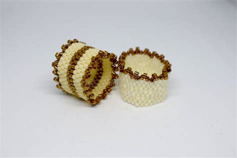 Beaded Rings Isolated on White Surface.Big Rings with Beads. Editorial Photography - Image of ...