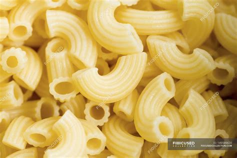 Cooked elbow pasta — yummy, shot - Stock Photo | #149589620