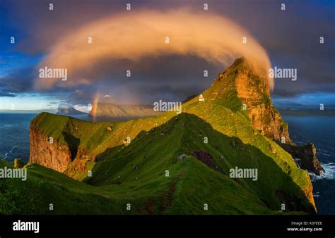 Kalsoy island and Kallur lighthouse in sunset light, Faroe Islands ...