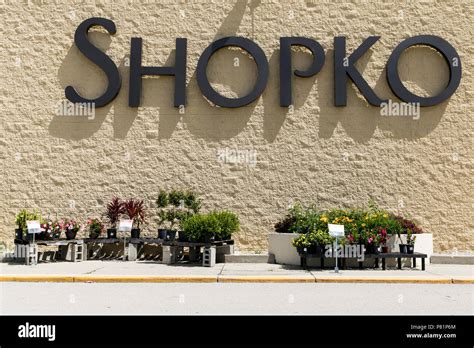 A Logo Sign Outside Of A Shopko Retail Store In Kenosha Wisconsin On