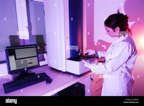 Scientist Researching At The Laboratory Stock Photo Alamy