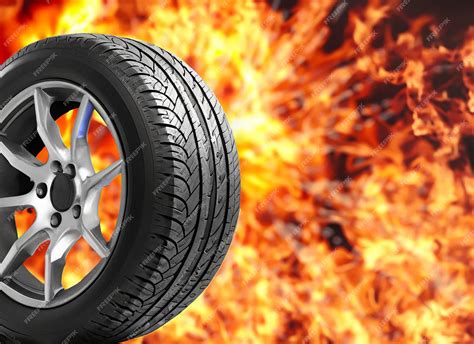 Premium Ai Image Car Tire In Fire Background