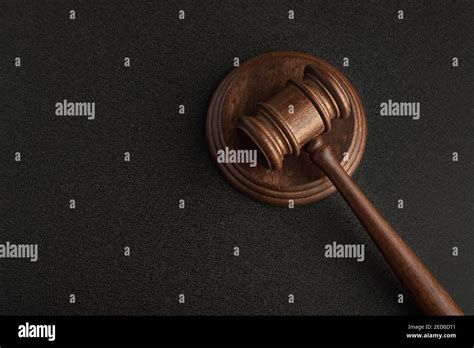 Wooden Judge Gavel And Sound Board Top View Auction Black Background