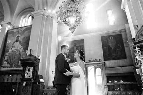 Premium Photo Bride And Groom Stand Hugging And Looking At Each Other