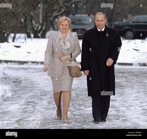 Russian President Vladimir Putin And His Wife Lyudmila On Their Way To