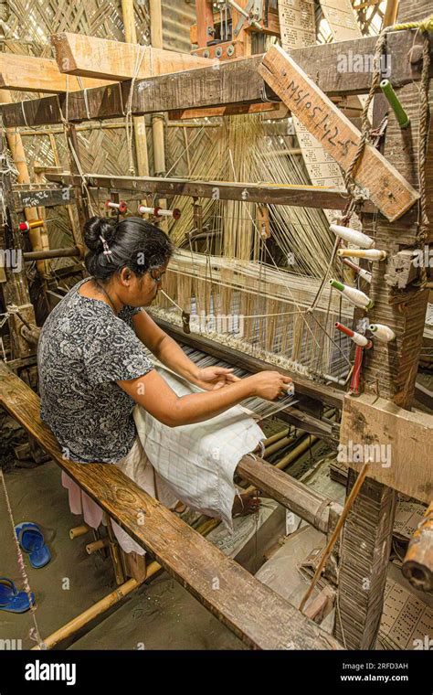 Woman Weaving Silk On A Loom In Sualkuchi A Small Town In Assam Which