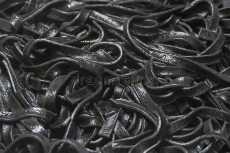 Black Squid Ink Pasta Fettuccine Cooked Background Stock Photo - Image ...