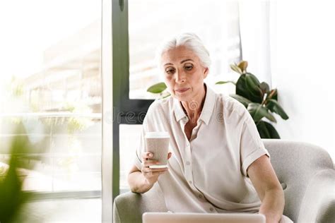 Confident Mature Business Woman Working On Laptop Stock Image Image