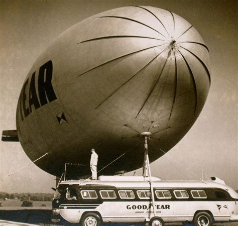 An Early Goodyear Blimp And The Airship Operations Docking Bus