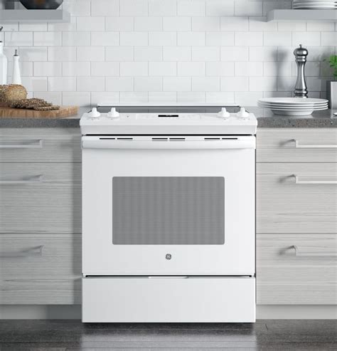 GE® 30" White Slide in Electric Range | Dick Van Dyke Appliance World ...