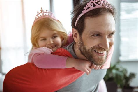 Glad Father Carrying Girl On Shoulders In Home Stock Photo Image Of