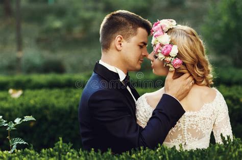 Sensual Beautiful Young Blonde Bride And Handsome Groom At Sunset In