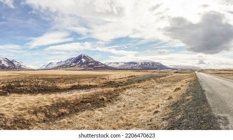 Asphalt Road Leading Icelandic Mountains Stock Photo