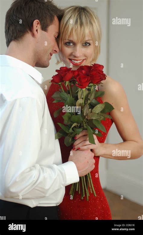 Female Blonde Jaw Length Layered Hair Wearing Black Eyeliner Red