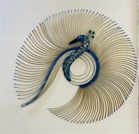 The Anusha Handicrafts Alluring Metal Blue Peacock Wall Art Decorations