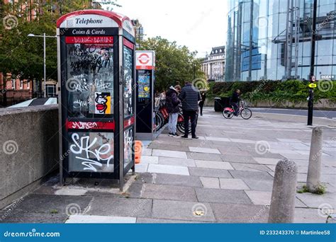 Public Telephone Call Box Vandalised with Street Art Graffiti Editorial ...