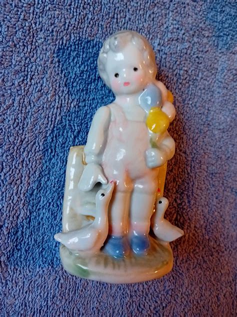 Porcelanowa Figurka Ch Opiec Z Balonami I Kaczki Ko Minek Olx Pl