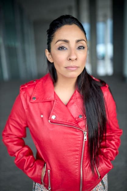 Premium Photo Close Up Of A Latina Girl In A Red Jacket