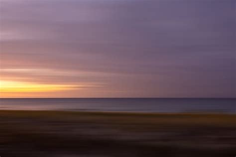 Calm Water in the Sea during Sunset · Free Stock Photo