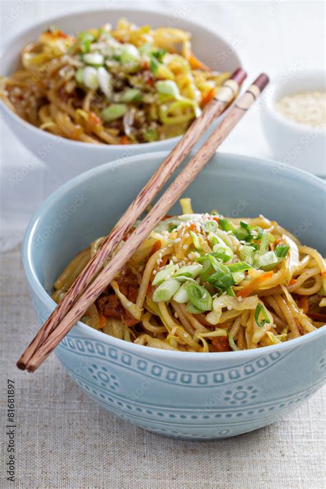 Stir fry with noodles, cabbage and carrot Stock Photo | Adobe Stock