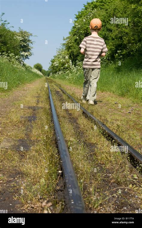 Young Boy Walking Train Tracks Hi Res Stock Photography And Images Alamy