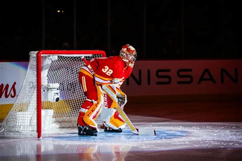 Calgary Flames goaltender Dustin Wolf is having a very busy, very ...