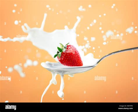 Strawberry Splash On White Background Hi Res Stock Photography And