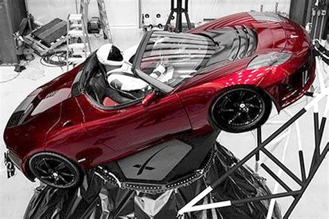 SpaceX ‘Starman’ at wheel of sports car flying on new rocket ...