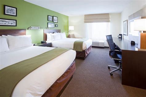 HOLIDAY INN EXPRESS & SUITES ROGERS, AN IHG HOTEL $120 ($̶1̶3̶4̶ ...