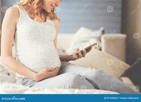 Cheerful Smiling Pregnant Woman Using Cell Phone Stock Image Image Of