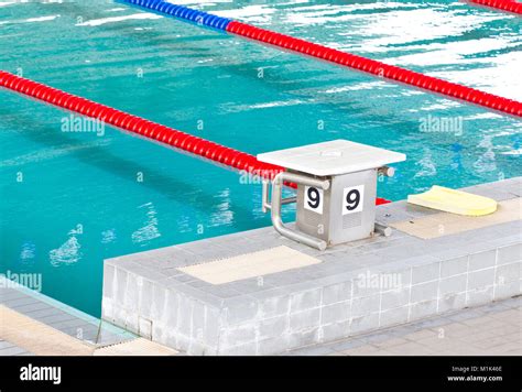 Empty Swimming Pool With Starting Block Stock Photo Alamy