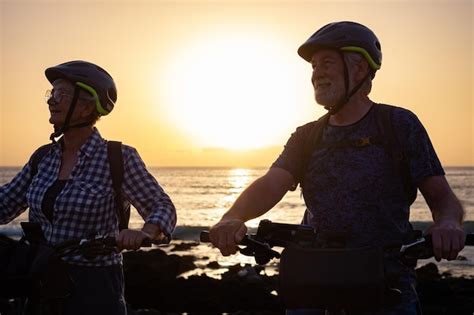 Premium Photo Silhouette Of Caucasian Senior Couple Riding With