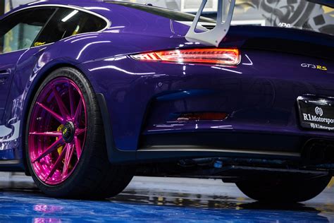 Ultraviolet Porsche 911 Gt3 Rs Poses With Pink Wheels Carscoops